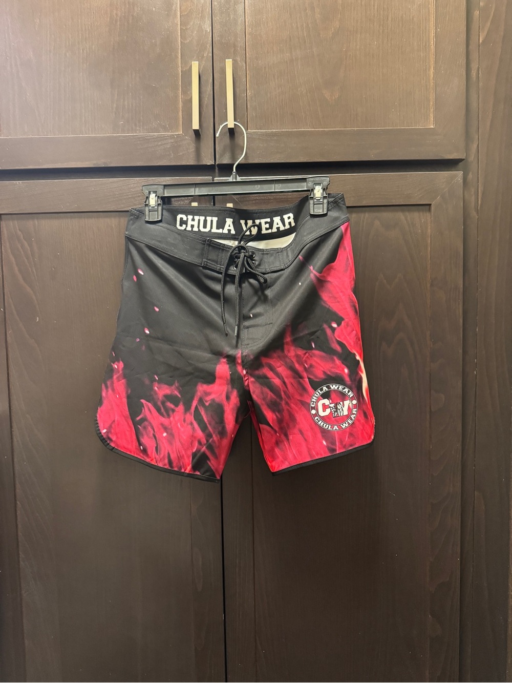 Chula Wear Men's Physique Competition Black Board Shorts with Fuscia Flame